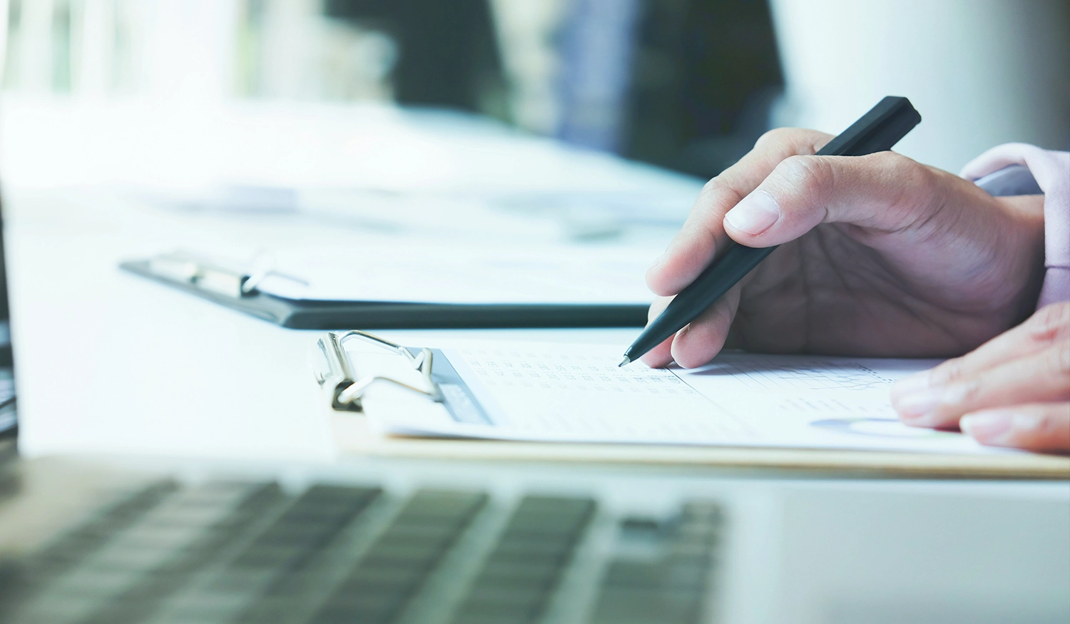 Attorney reviewing and signing proof of service documents for court filing